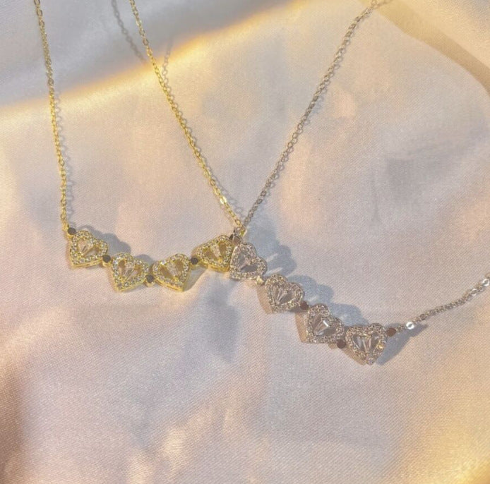 Collana a quadrifoglio con cuore pieghevole magnetico