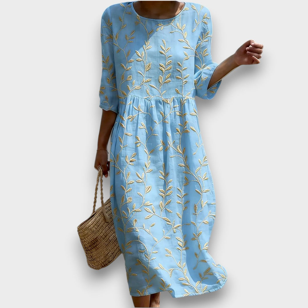 Sira| Midi Dress with Round Neckline and Plant and Flower Print