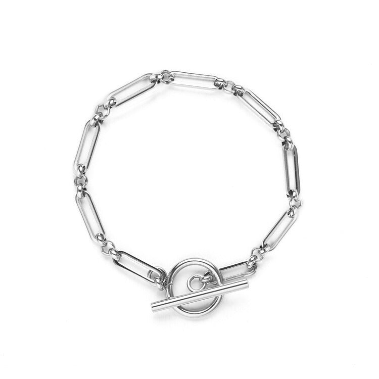 Pulsera Eslabón con Barra T Oro Blanco
