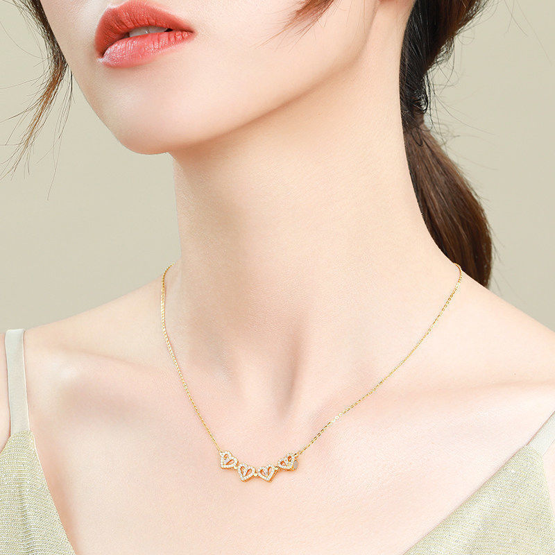Collana a quadrifoglio con cuore pieghevole magnetico